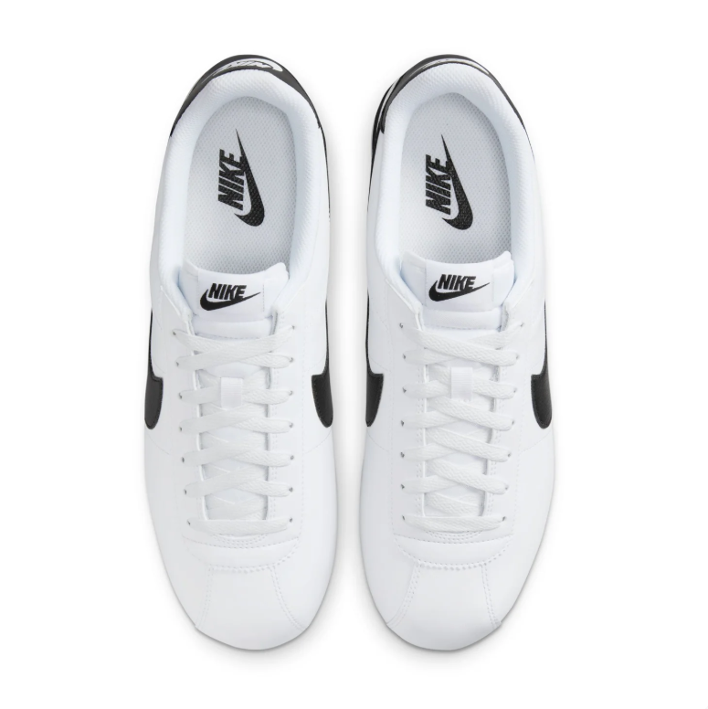 Nike White Low-Top Sneakers with Black Swoosh Details