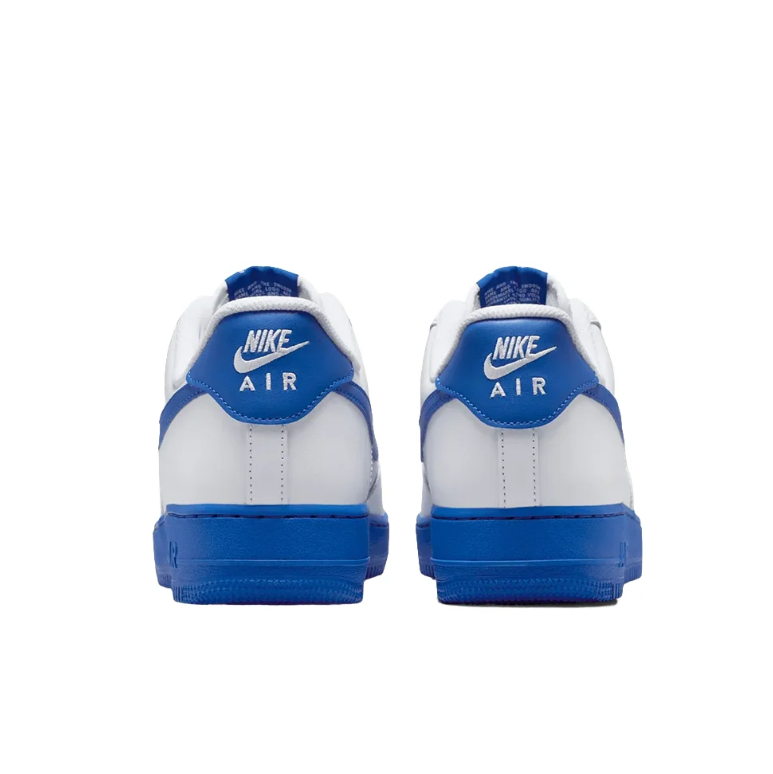 Nike White Low-Top Sneakers with Royal Blue Swoosh and Soles