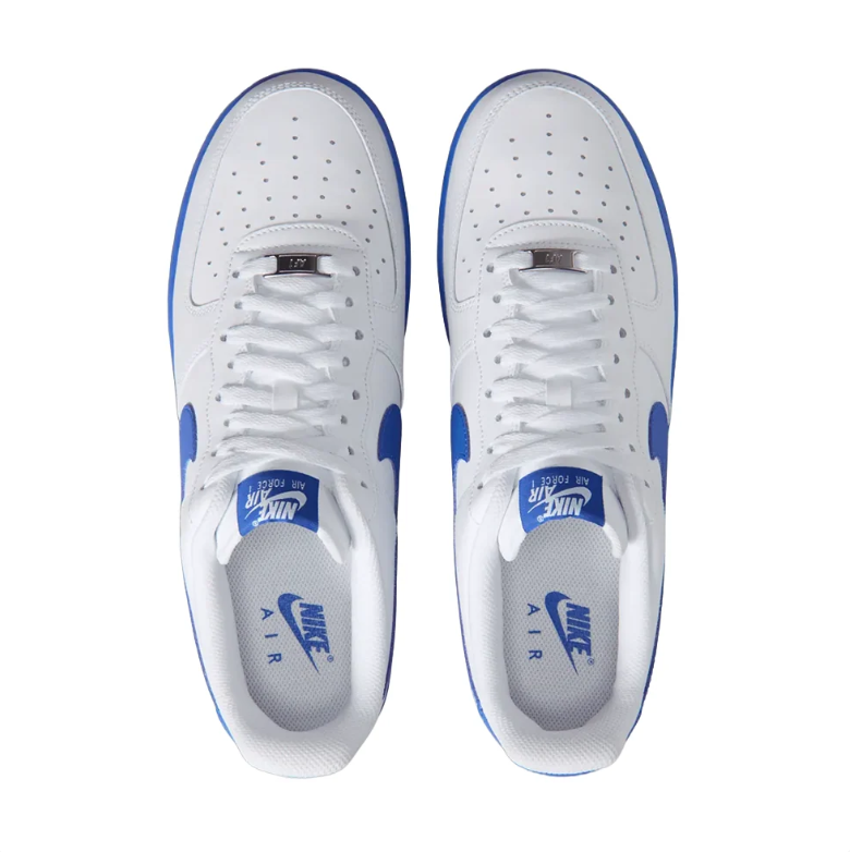 Nike White Low-Top Sneakers with Royal Blue Swoosh and Soles