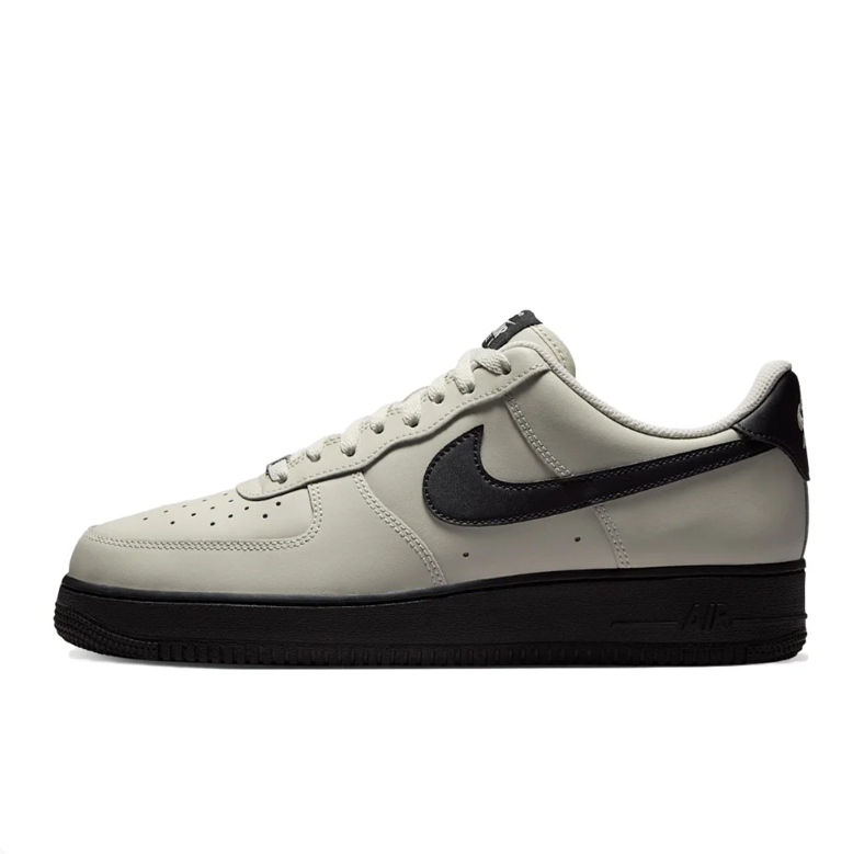 Nike Light Gray Low-Top Sneakers with Black Swoosh and Soles
