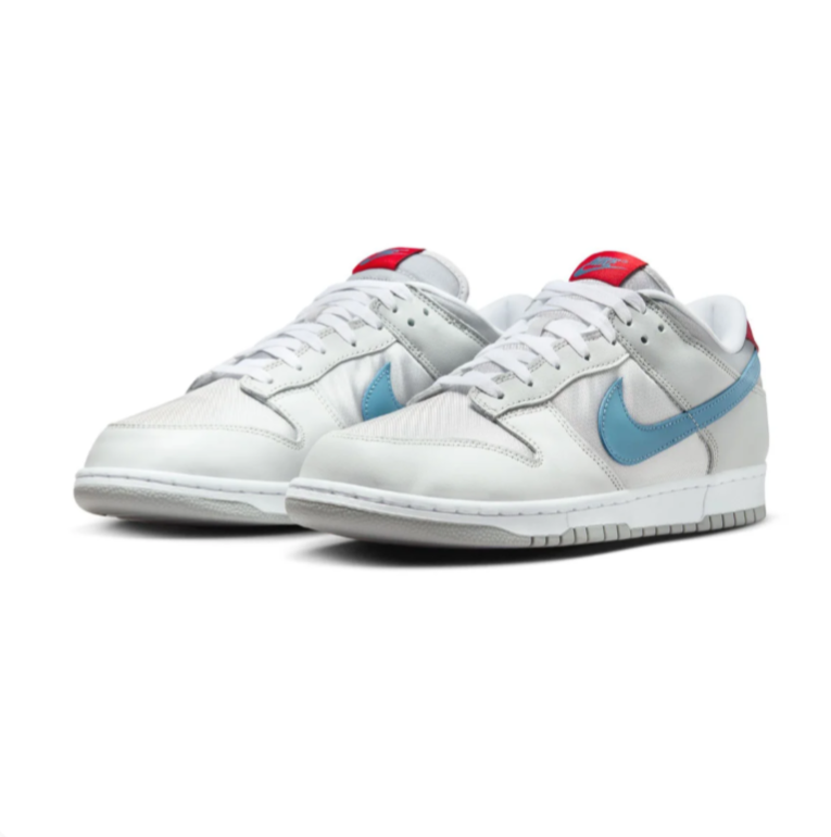 Nike Light Gray Low-Top Sneakers with Blue Swoosh and Red Accents
